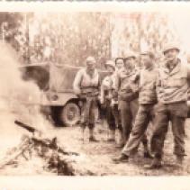 Front to back: Bob Meyer, Robert Francis Murphy, Jack Euaws, Paul Black, J Salamans, J Ruggles 1945 Bivouac are Kemtz Combat Village