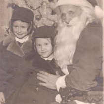 Jeanne and Maureen Murphy with Santa Claus