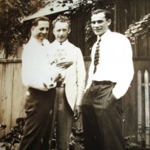 Roy Hall holding Roy Whittle, Frederick Whittle and Joe Hall