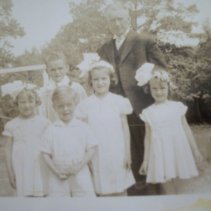 Roy Whittle, Frederick Whittle, Mary Louise Whittle, William Whittle, Jeannette Whittle, and Margaret Whittle. May Procession at Church.