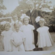 Roy Whittle, Frederick Whittle, Mary Louise Whittle, William Whittle, Jeannette Whittle, and Margaret Whittle. May Procession at Church.