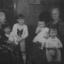 From Left to right Sister of Fanny (Kelly) Gough possibly Lena Kelly (but could be Mary Kelly) next to her is David Murphy, Joseph Murphy, Richard Murphy is on her Grandmother Fanny (Kelly) Gough's lap and in front of her is Robert Murphy